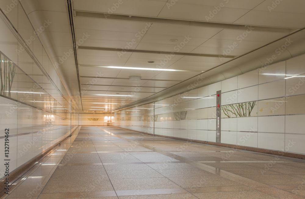 Perspective of Empty underground passage at night