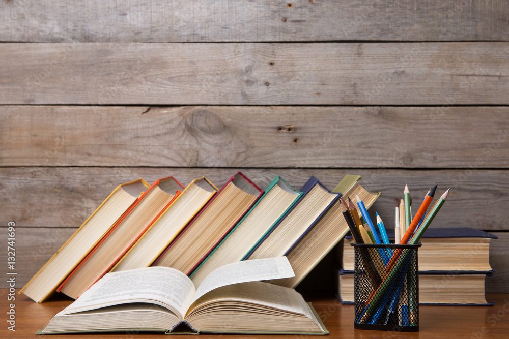 books on the wooden background