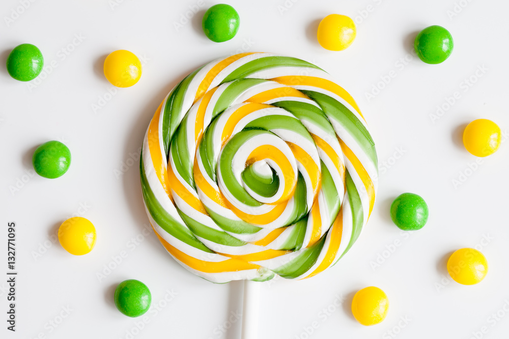 sweets and sugar candies on white background top view