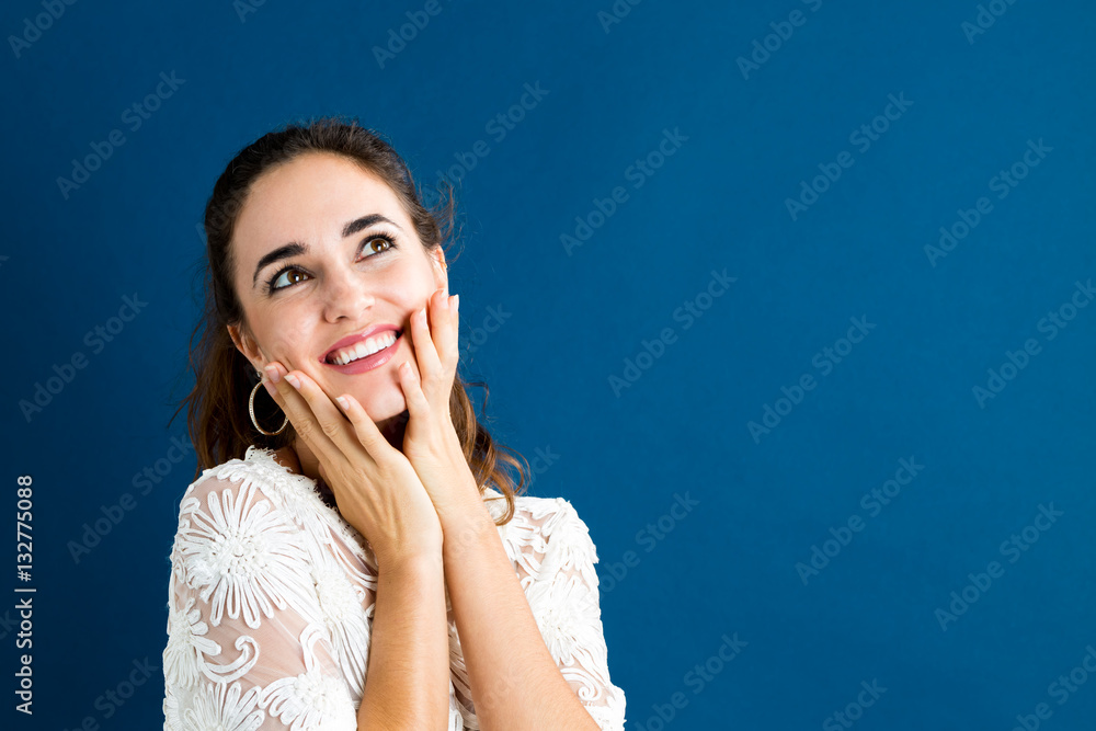 Surprised young woman posing