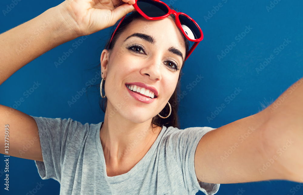 Young woman taking a selfie