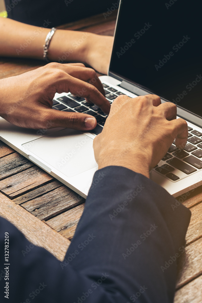 Businessman using laptop in Business meeting