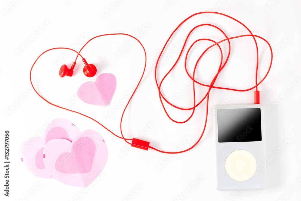 music player with red earphone and paper note on white backgroun