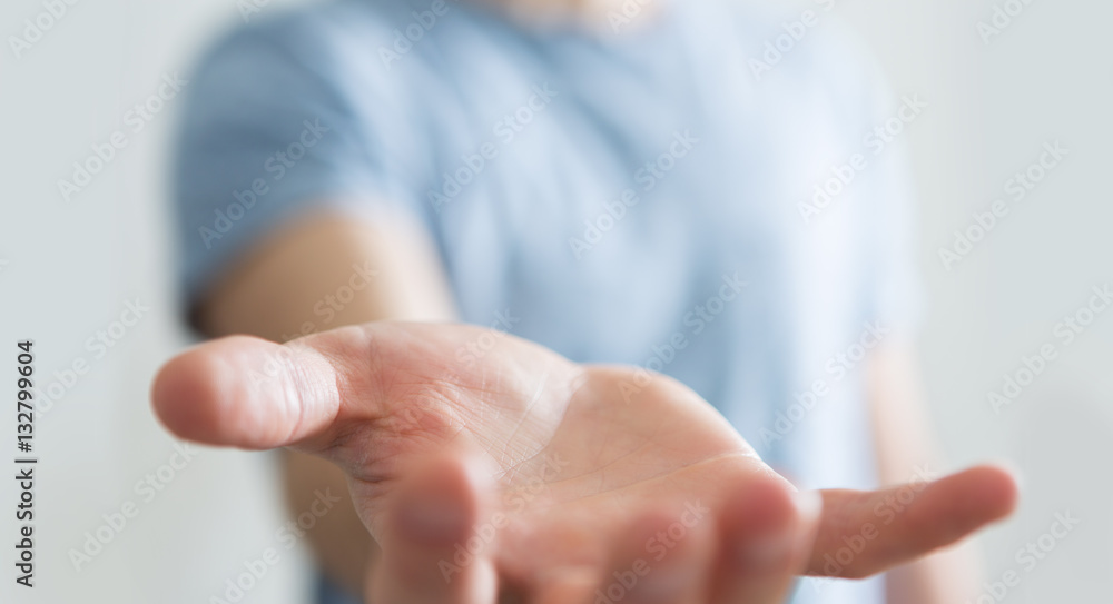 Businessman showing his empty hand