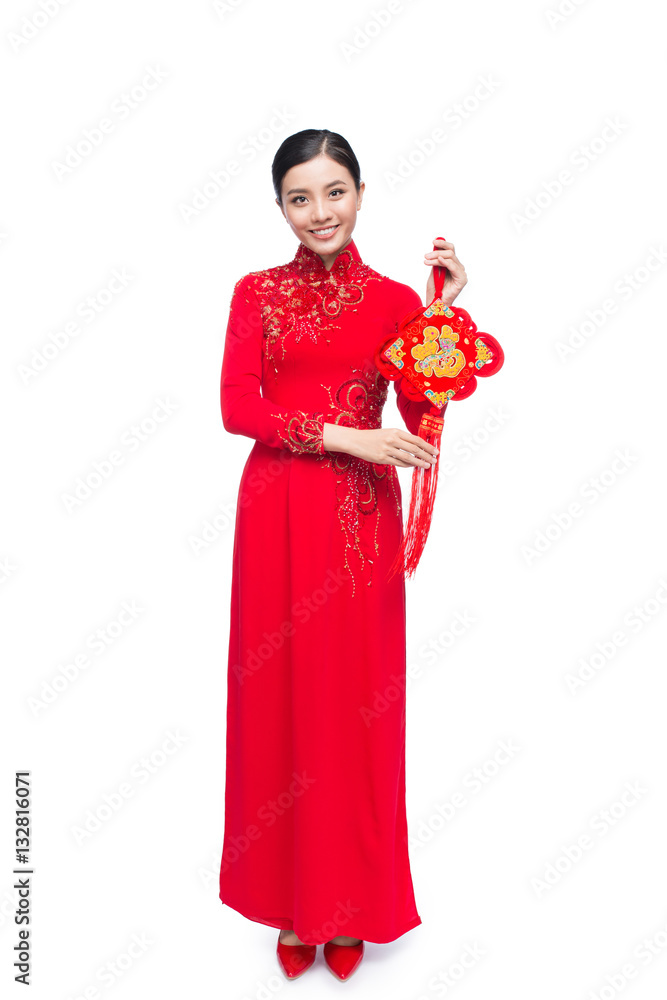 Full length of a beautiful Asian woman on traditional Ao Dai Dress.