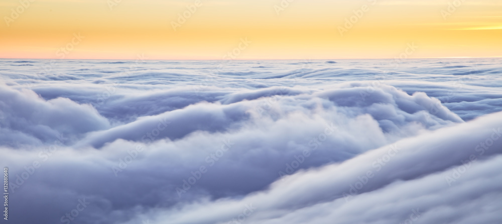 Beautiful sunset above clouds