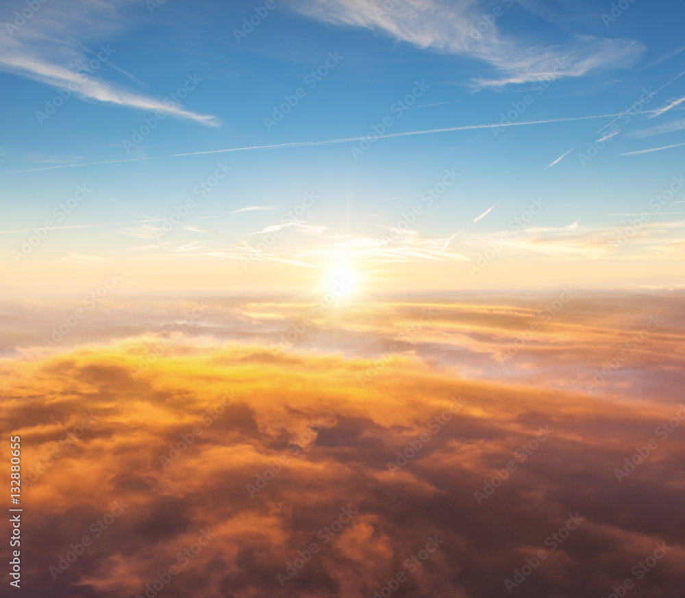 Beautiful sunset above clouds