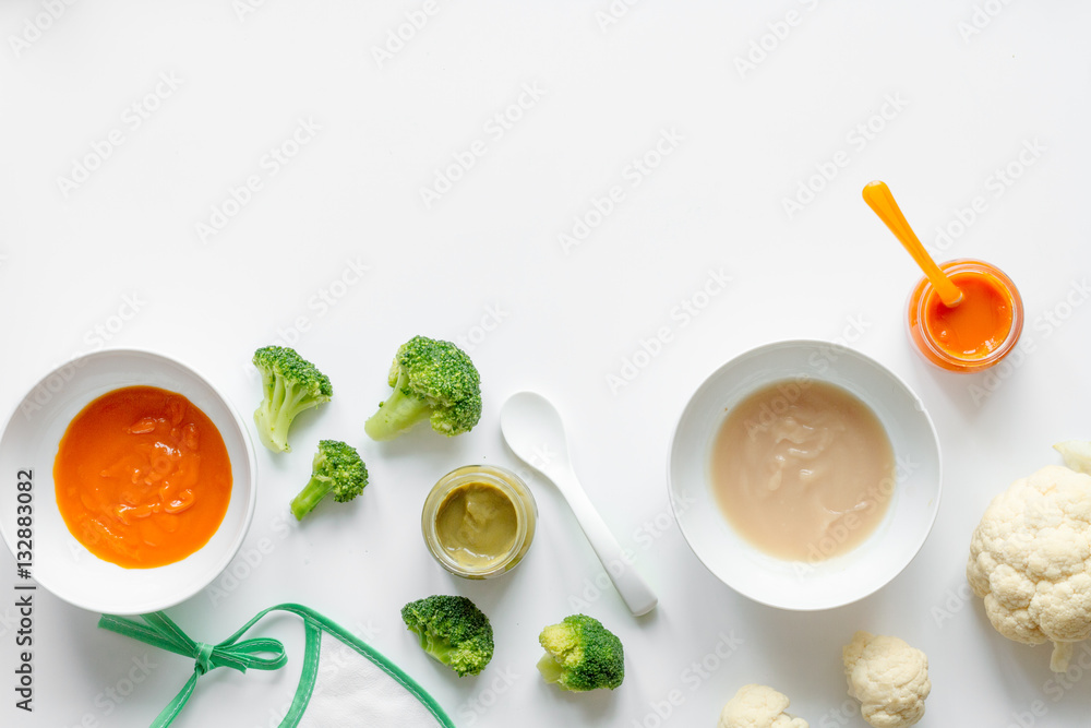 cooking vegetable puree for baby on white background top view