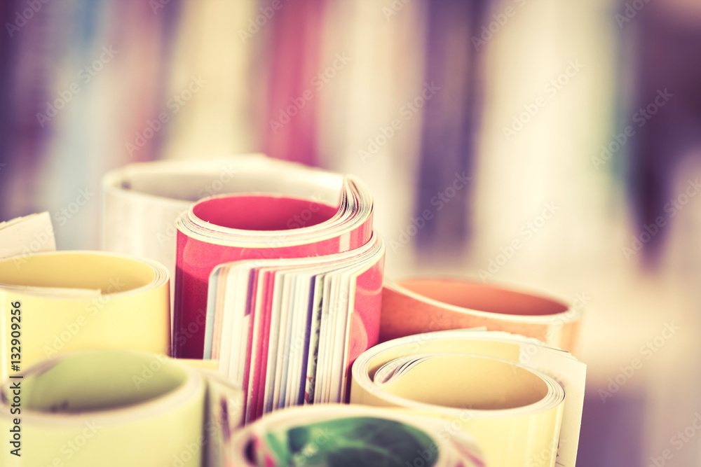 Close up edge of colorful magazine stacking roll 