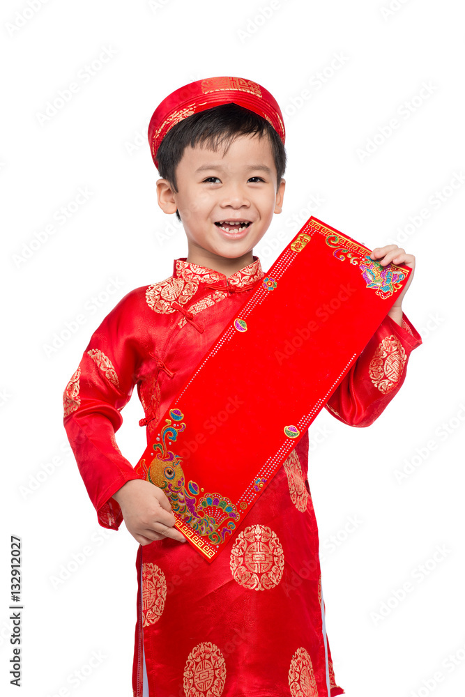 Happy Vietnamese boy in red Ao Dai celebrating New Year with con with con