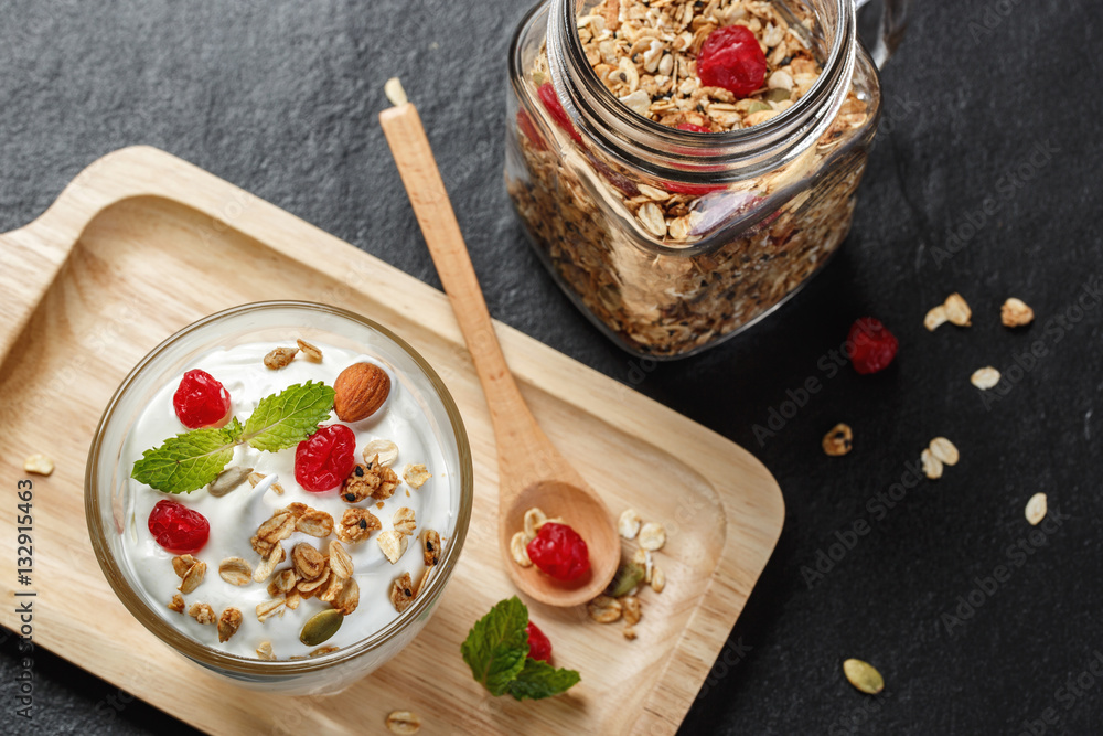 Greek yogurt on black stone slab