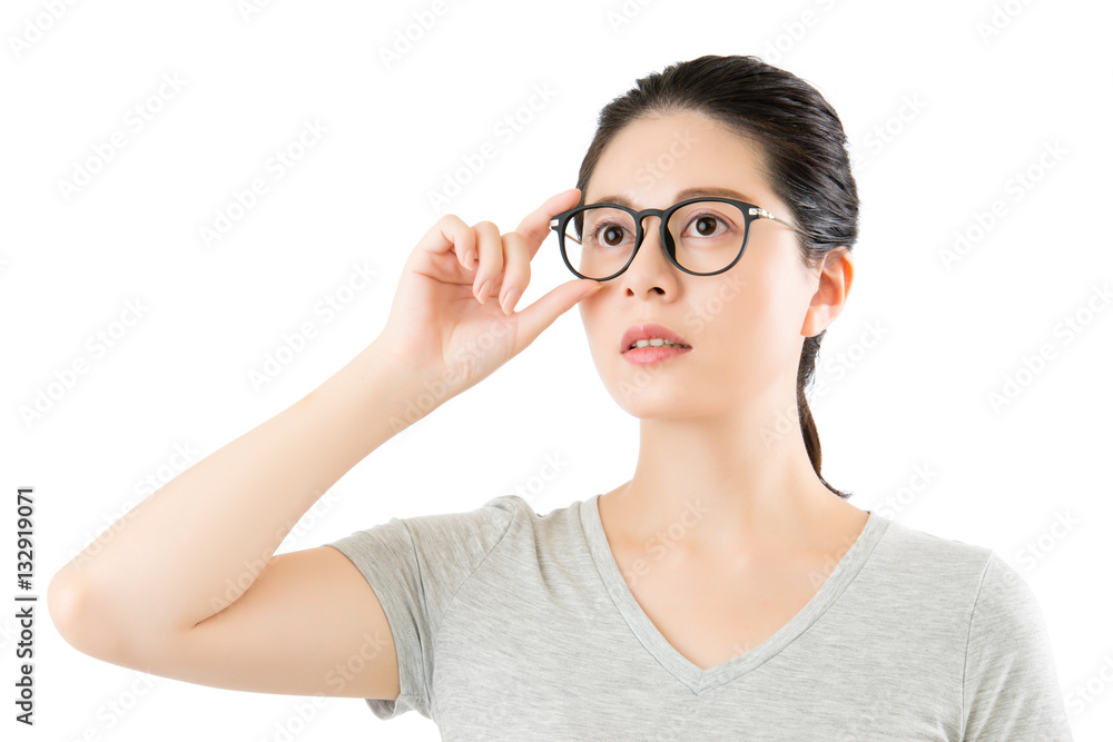 asian woman content natural looking over her classy glasses