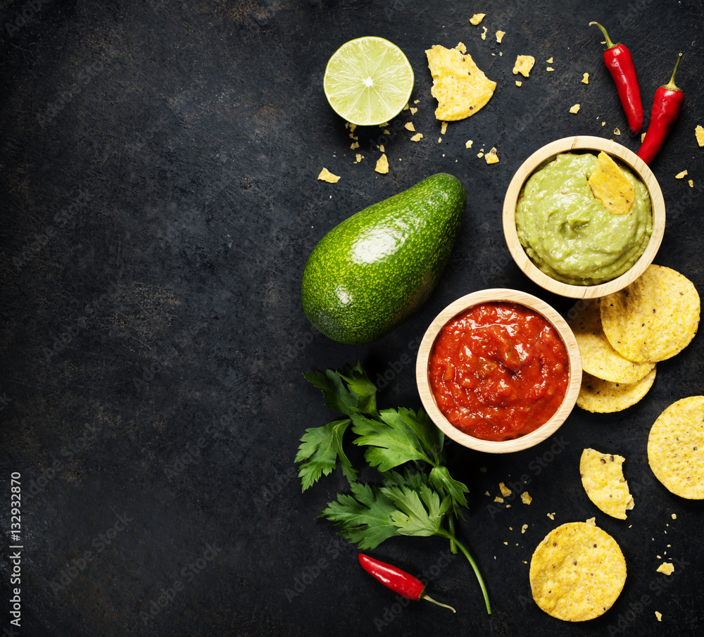 Green Homemade Guacamole with Tortilla Chips and Salsa