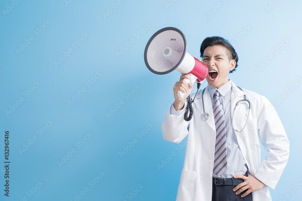 male doctor take microphone