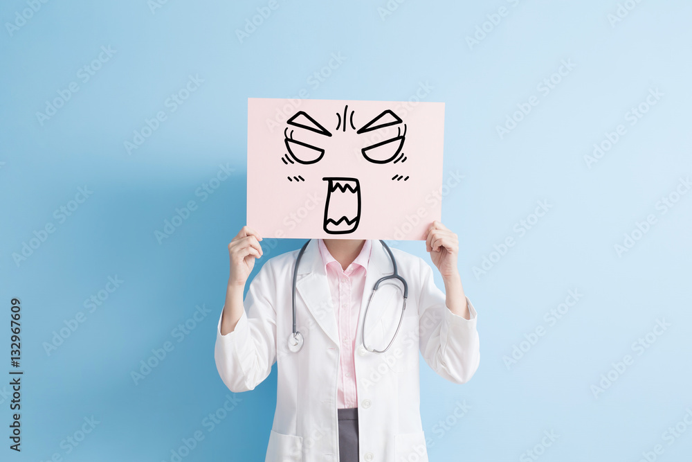 woman doctor show angry billboard