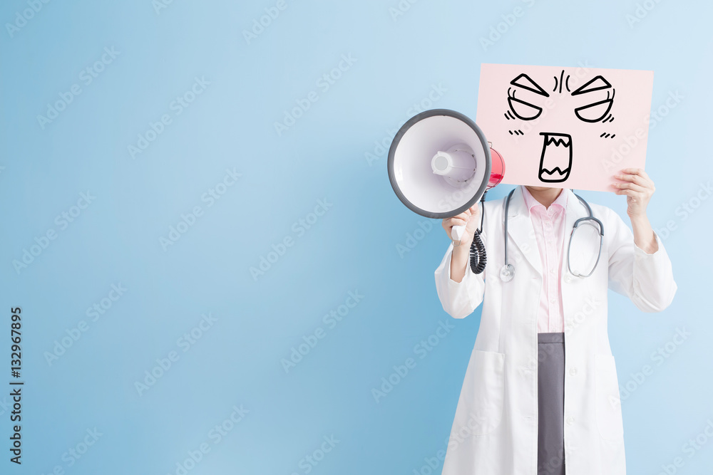 doctor take billboard and microphone