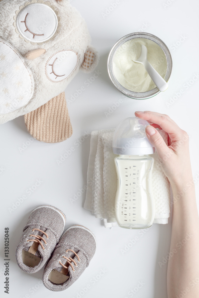 preparation of mixture baby feeding on white background top view