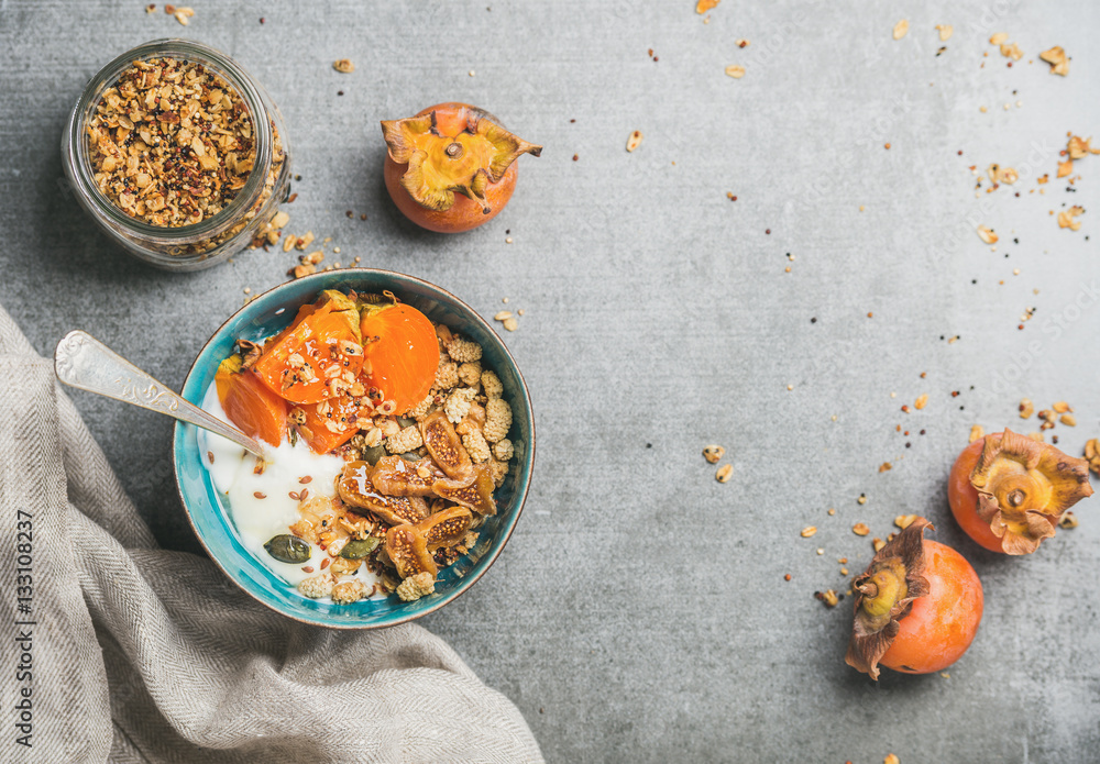 Healthy vegetarian breakfast. Oatmeal, quinoa granola with yogurt, dried fruit, seeds, honey, fresh 