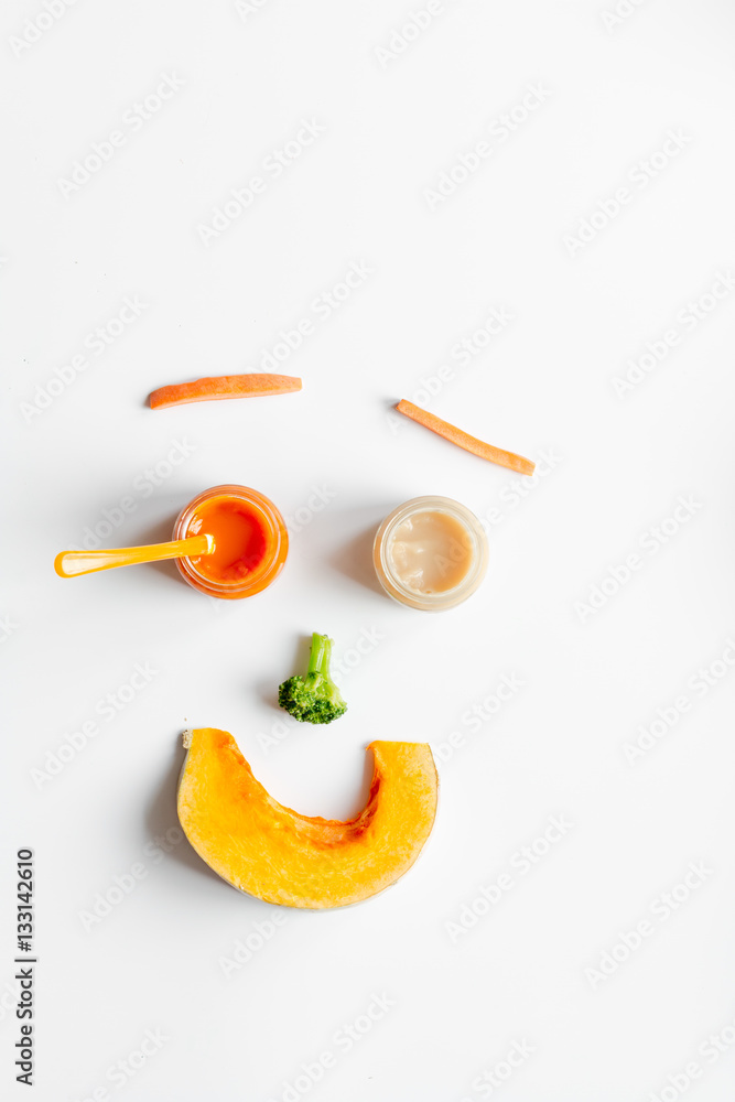 cooking vegetable puree for baby on white background top view