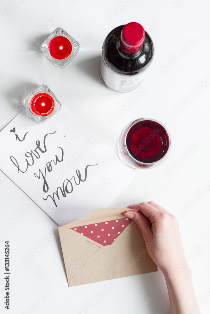 concept of Valentine Day love letter white background top view