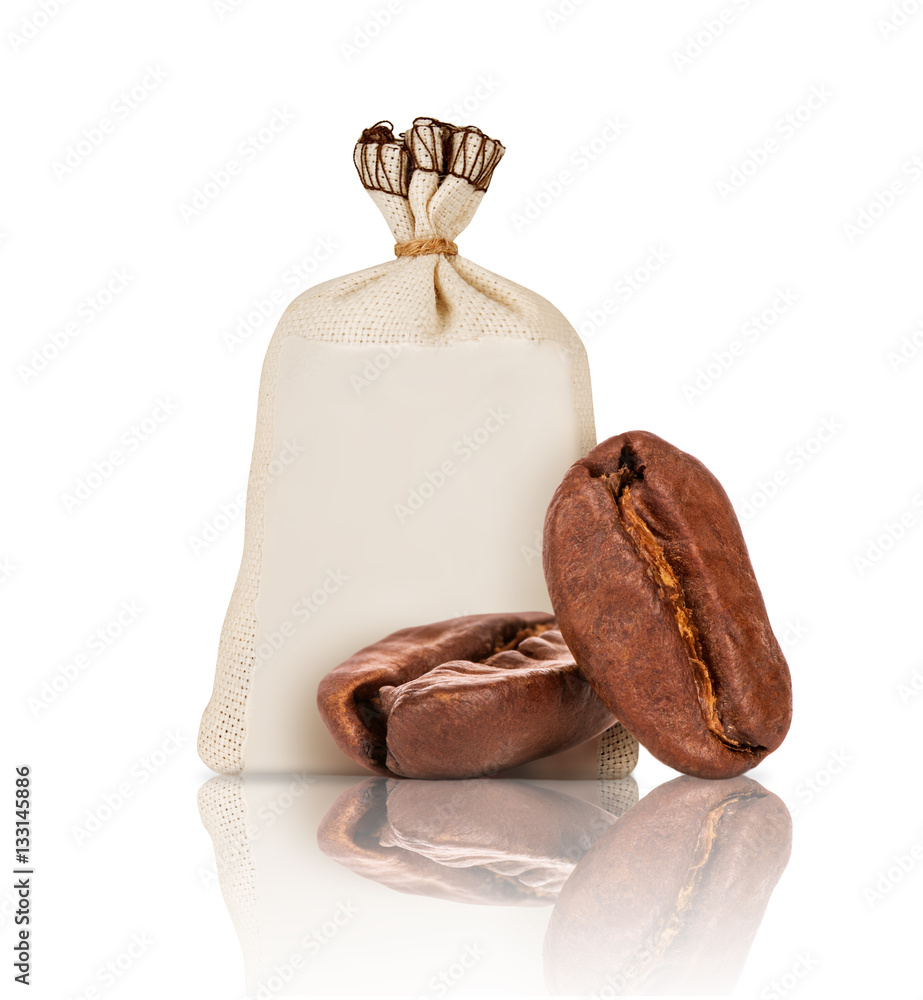 Two coffee beans closeup and bag with coffee on white background