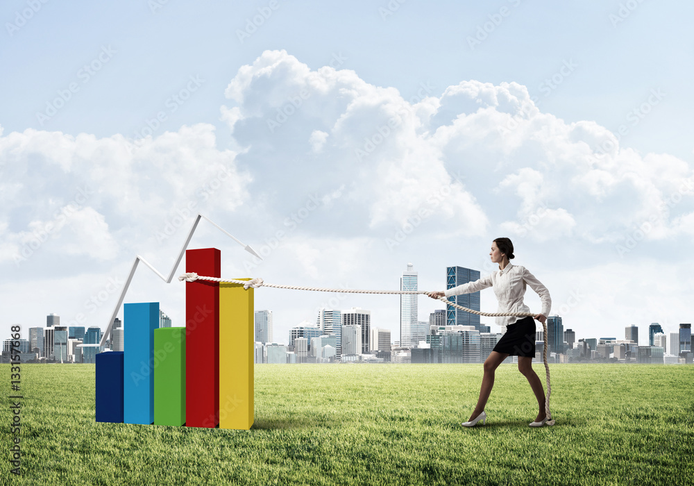 Businesswoman pulling arrow with rope and making it raise up