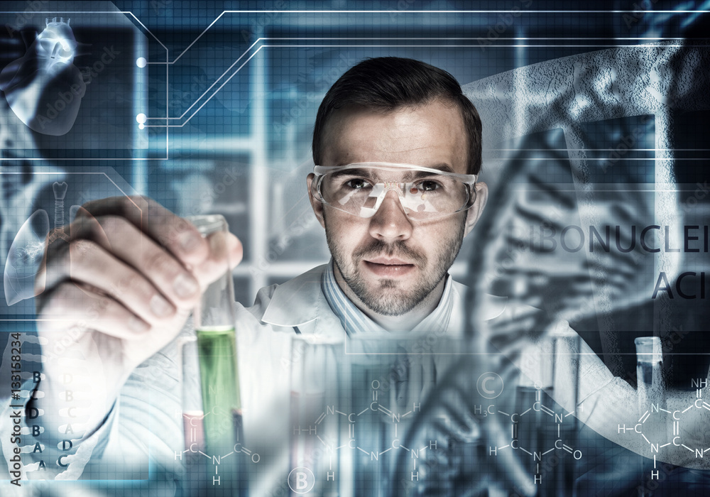 Young scientist mixing reagents in glass flask in clinical laboratory