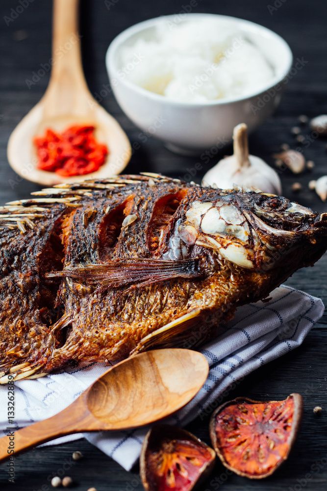  fish fried and rice with vegetable