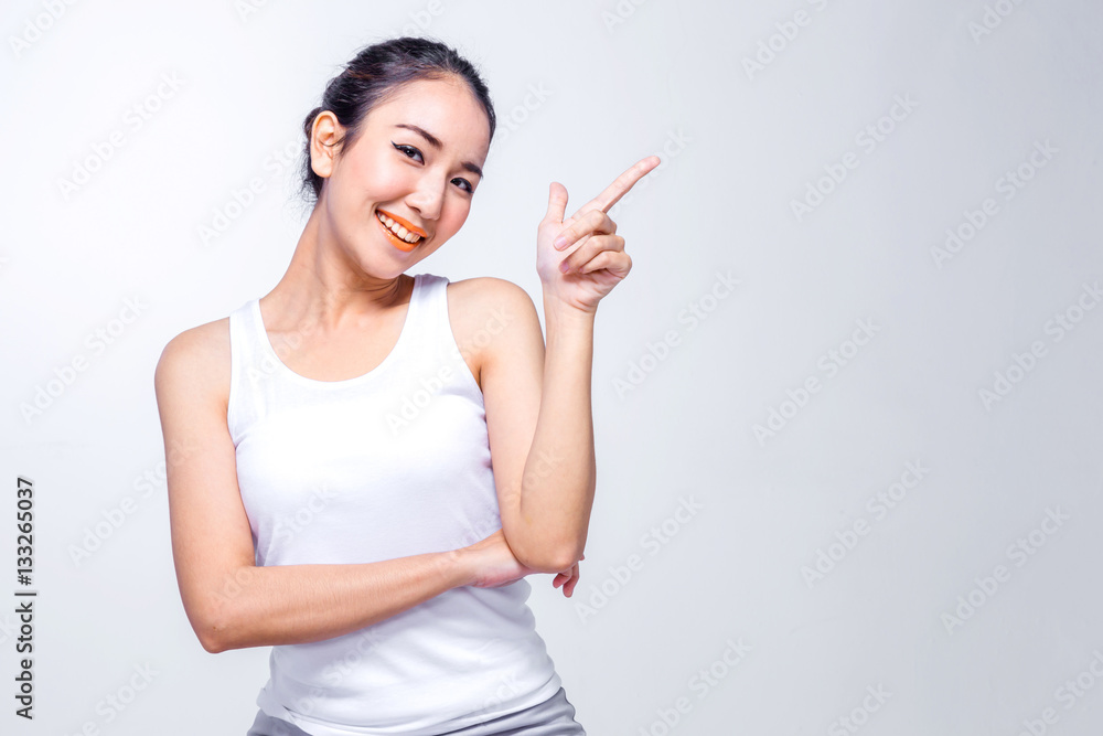 Beautiful young asian woman thinking on white background