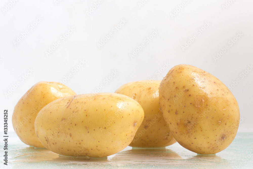 Four Wet Potatoes