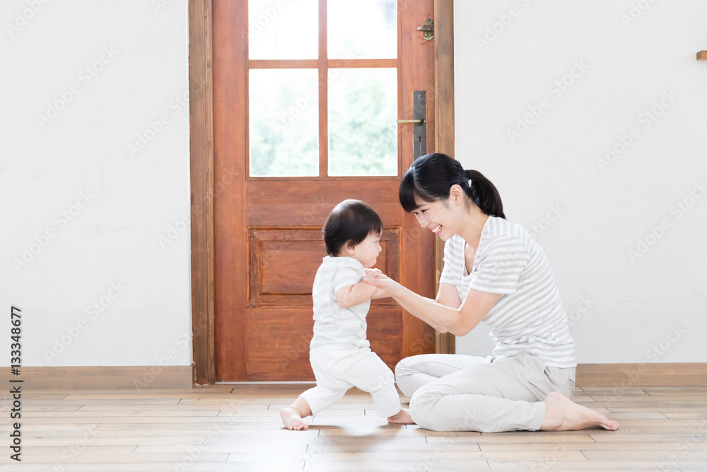 portrait of asian baby and mother relaxing