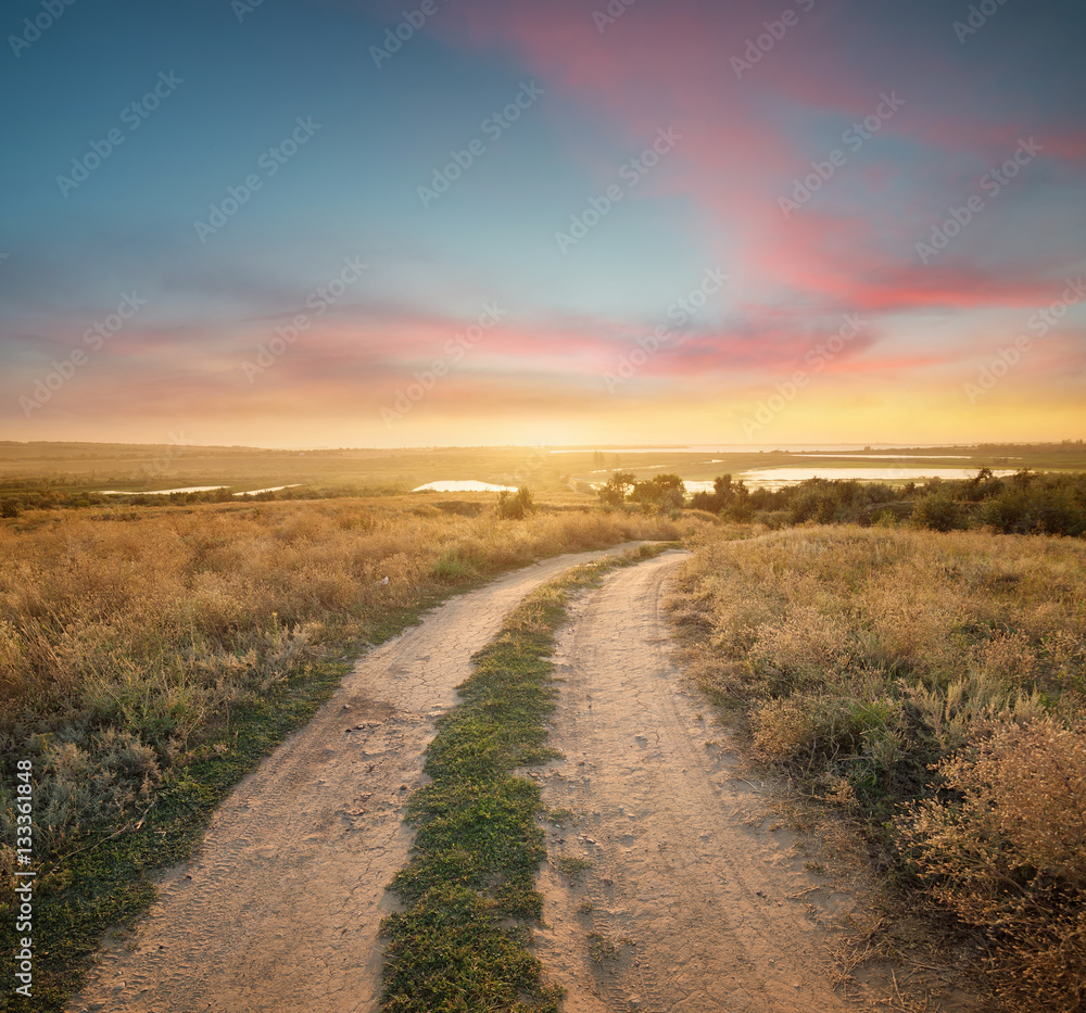 Rural road on the mountain hill. Beautiful natural landscape