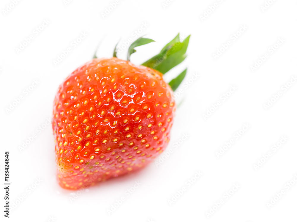 Closeup of fresh strawberry isolated on white background