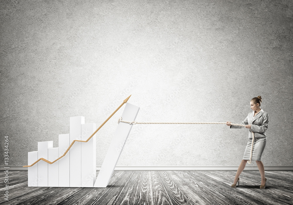 Businesswoman pulling graph with rope as symbol of power and control