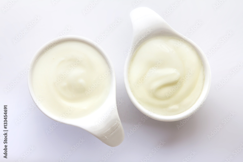 Close up natural creamy white yogurt in cup