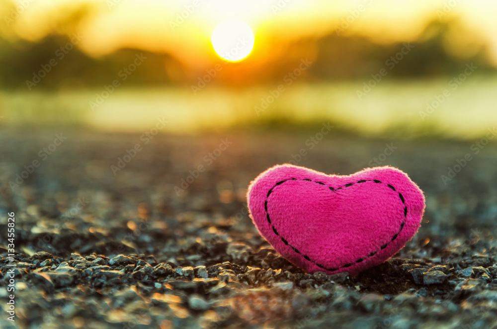 Valentines Day. knitted hearts. pink heart and sunset