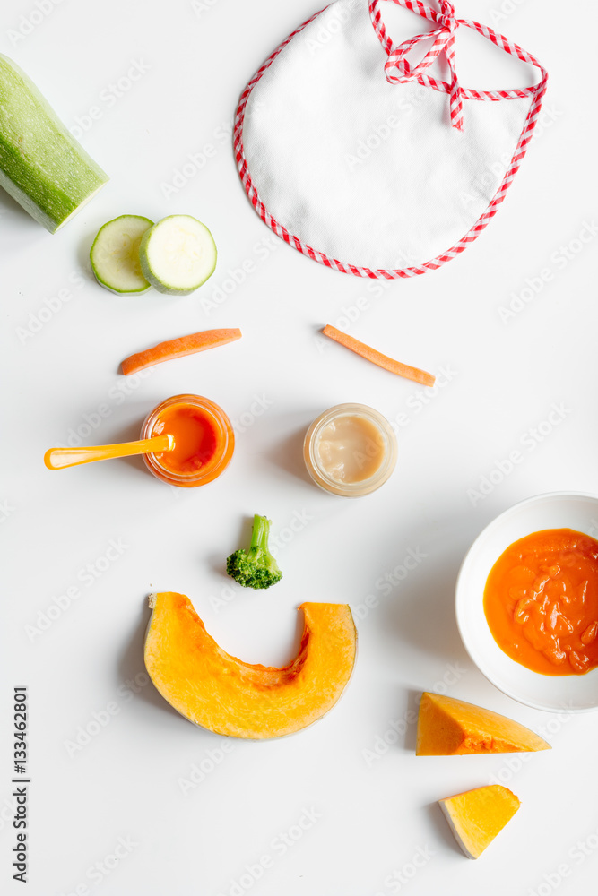 cooking vegetable puree for baby on white background top view