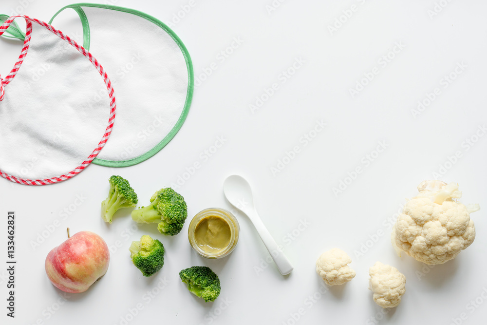 cooking vegetable puree for baby on white background top view