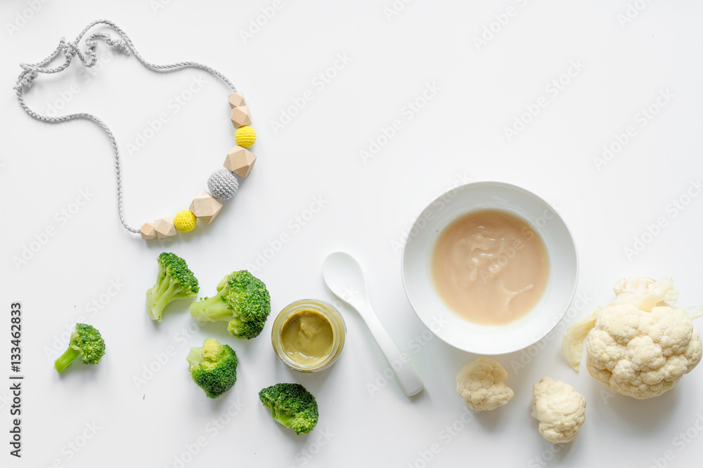 cooking vegetable puree for baby on white background top view