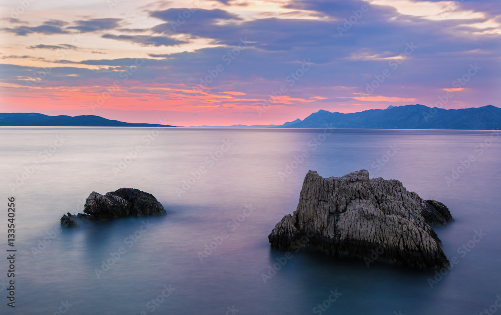 Spectacular sunset on adriatic sea in Croatia, Makarska riviera,Croatia