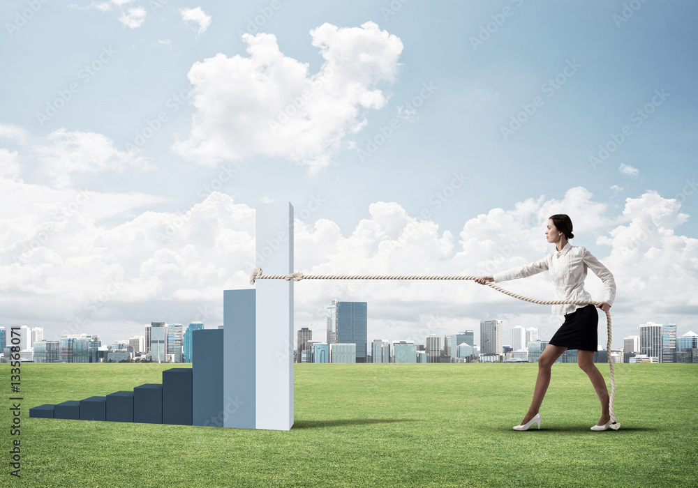 Businesswoman pulling arrow with rope and making it raise up