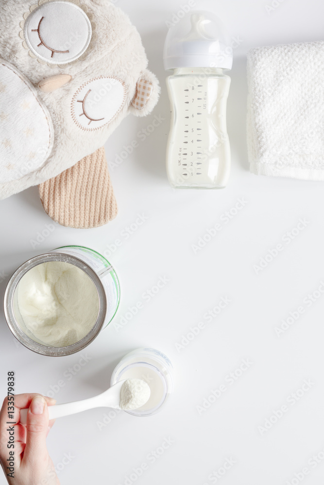 preparation of mixture baby feeding on white background top view