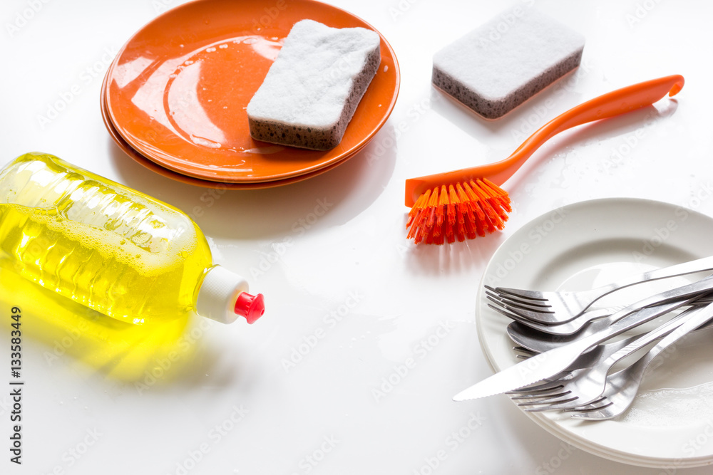 concept of washing dishes on white background