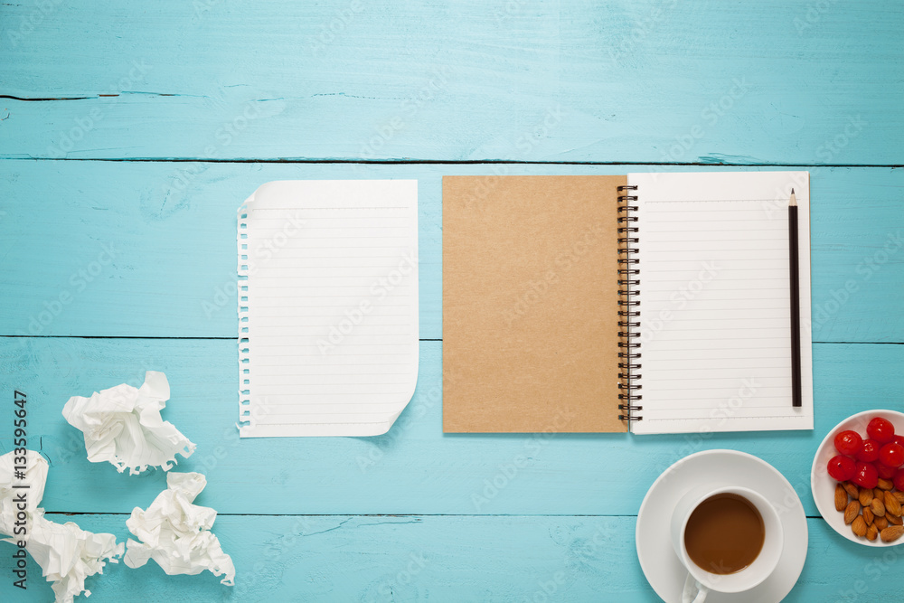 Top view of Blank paper and pencil ,coffee,almond,cherry