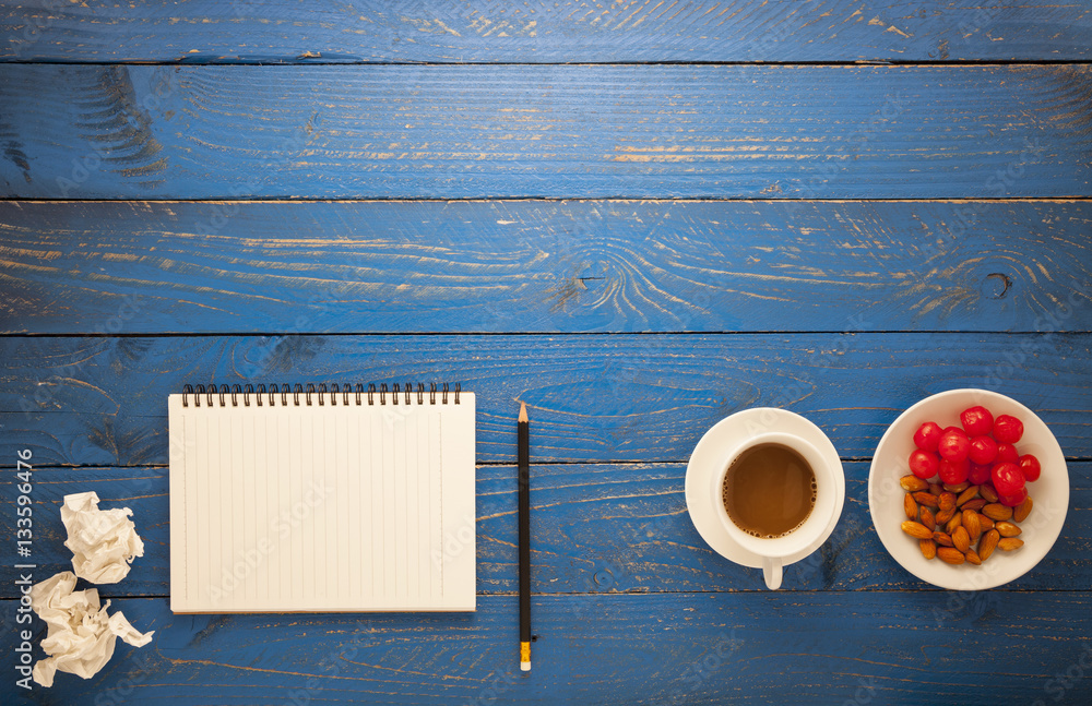 Top view of Blank paper and pencil ,coffee,almond,cherry