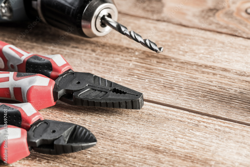 Carpentry tools on wooden surface