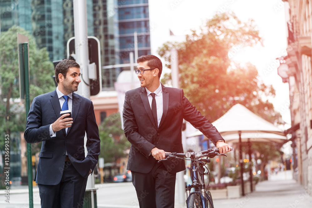 Two businessmen having walk