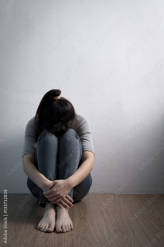 depression woman sit on floor