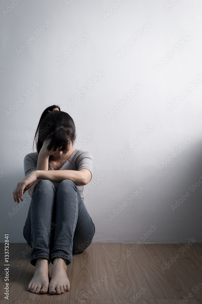 depression woman sit on floor