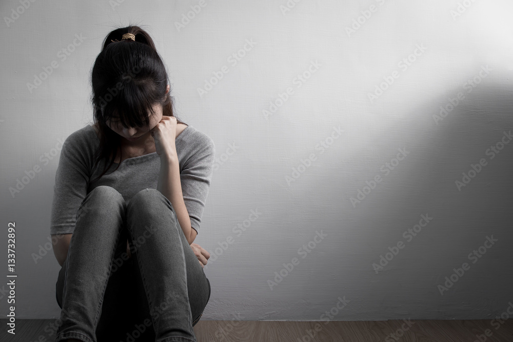 depression woman sit on floor